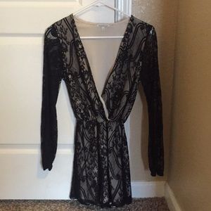 Low cut black and nude romper